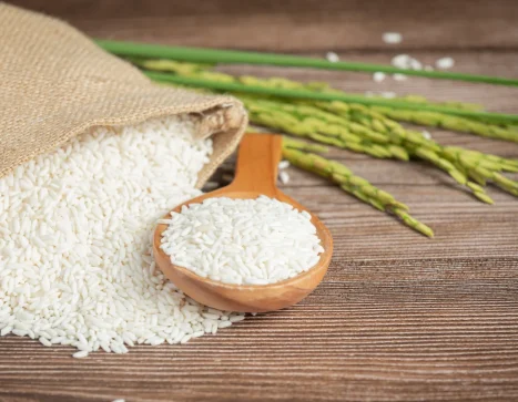 sack-rice-with-rice-wooden-spoon-rice-plant